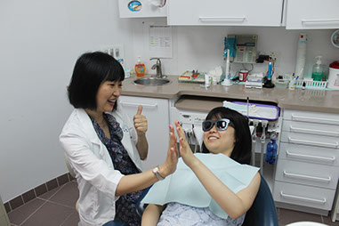 Dr. Tenny Leung and a patient image